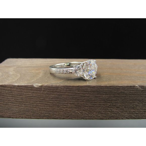 Size 7 Sterling Silver Brilliant Clear CZ With Trillion Accents Band Ring - Picture 3 of 9